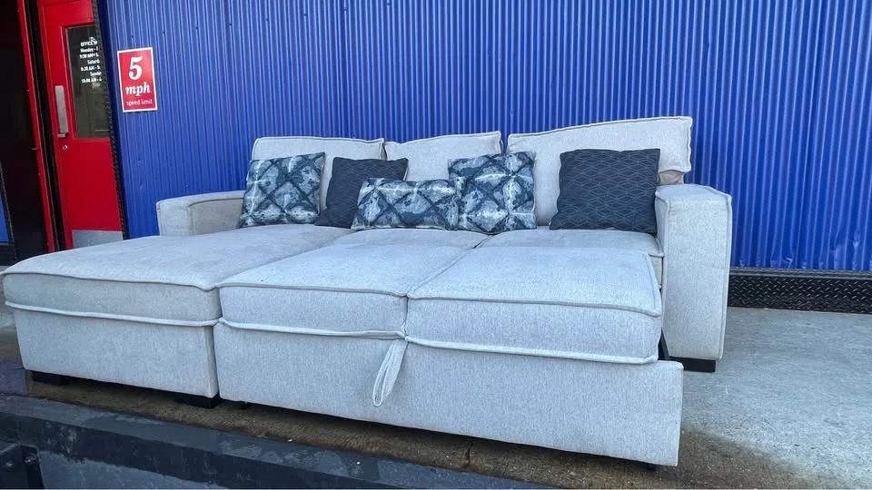 (FREE DELIVERY) Gray Bobs Furniture pullout bed sectional couch image indicator(6)