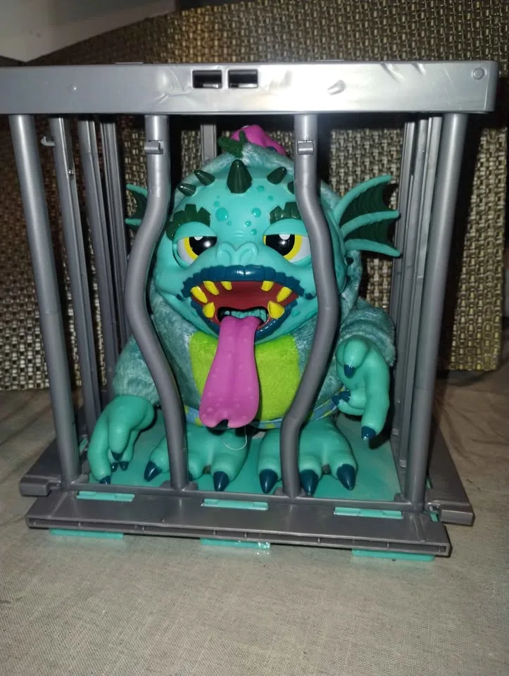 Cute Monster Toy in a Cage | Moves Eyes When You Wind It Up image indicator(2)