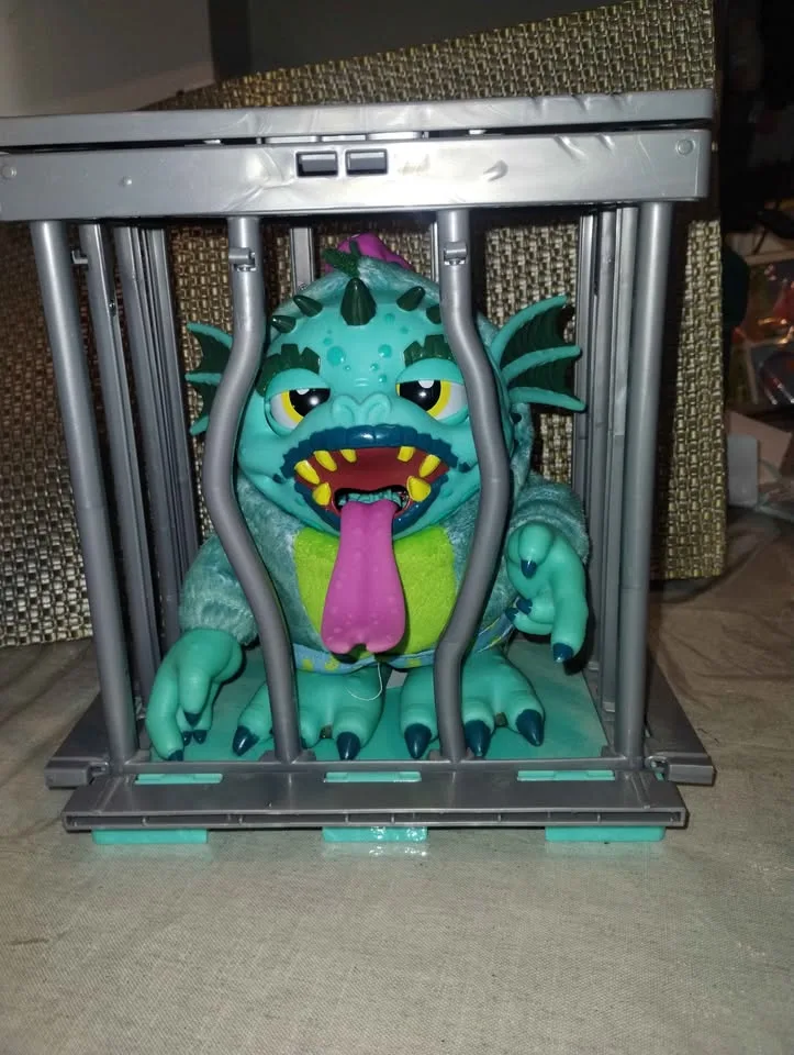 Cute Monster Toy in a Cage | Moves Eyes When You Wind It Up image indicator(3)
