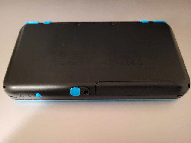 Nintendo 2DS XL Turquoise (Great Condition) - photo 3