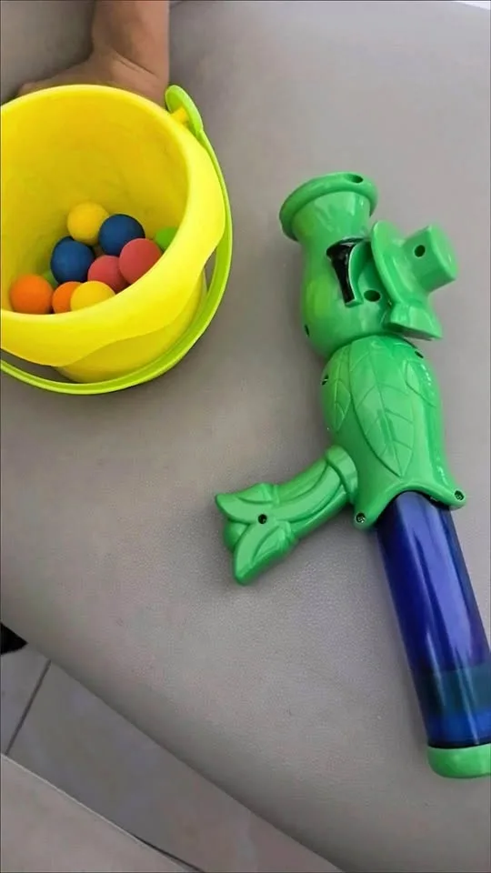 Pet toy shooting gun with EVA balls