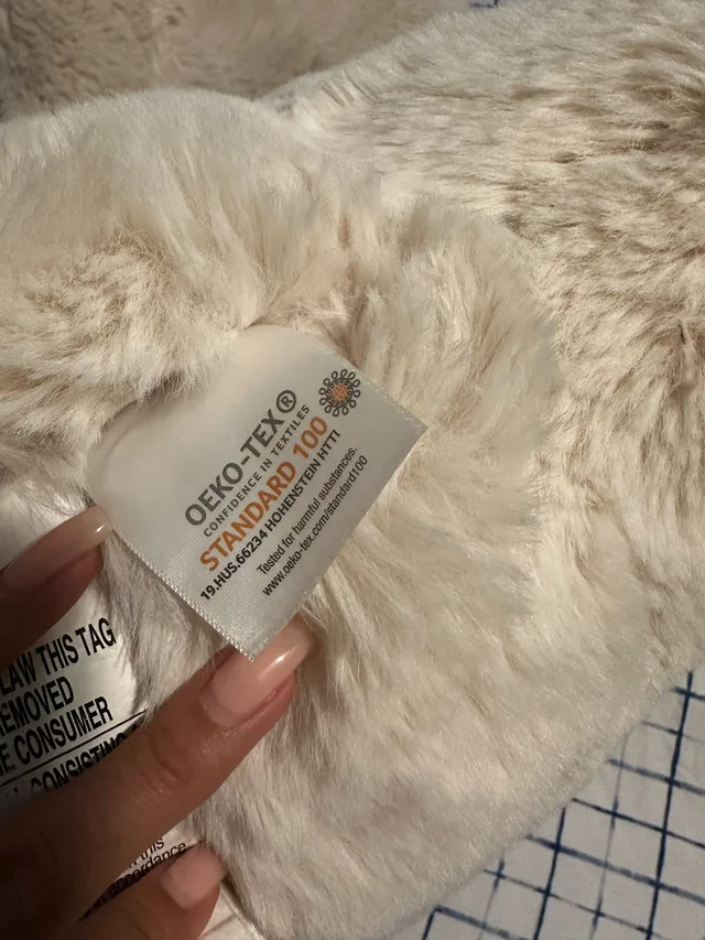 White fluffy pillow, bolsters & carpet image indicator(3)