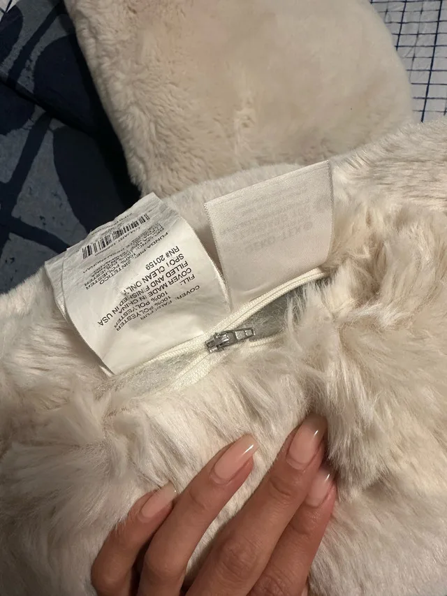 White fluffy pillow, bolsters & carpet image indicator(4)