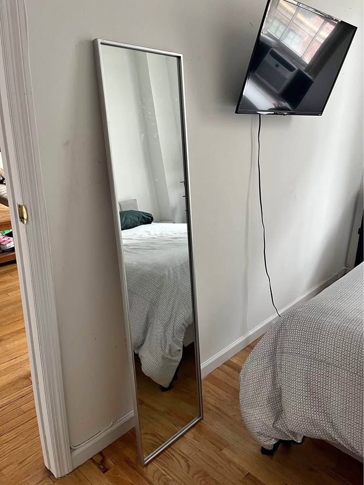 Silver standing mirror
