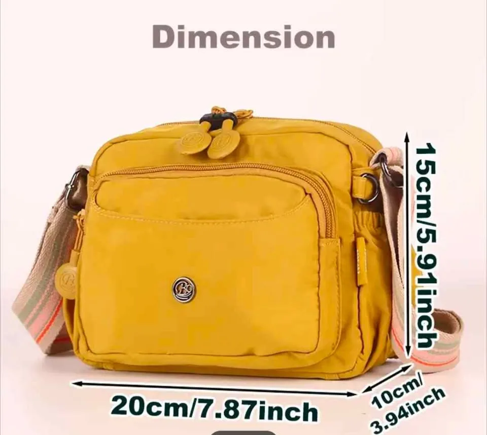Brand new light weight nylon crossbody bag with multiple zips image indicator(2)
