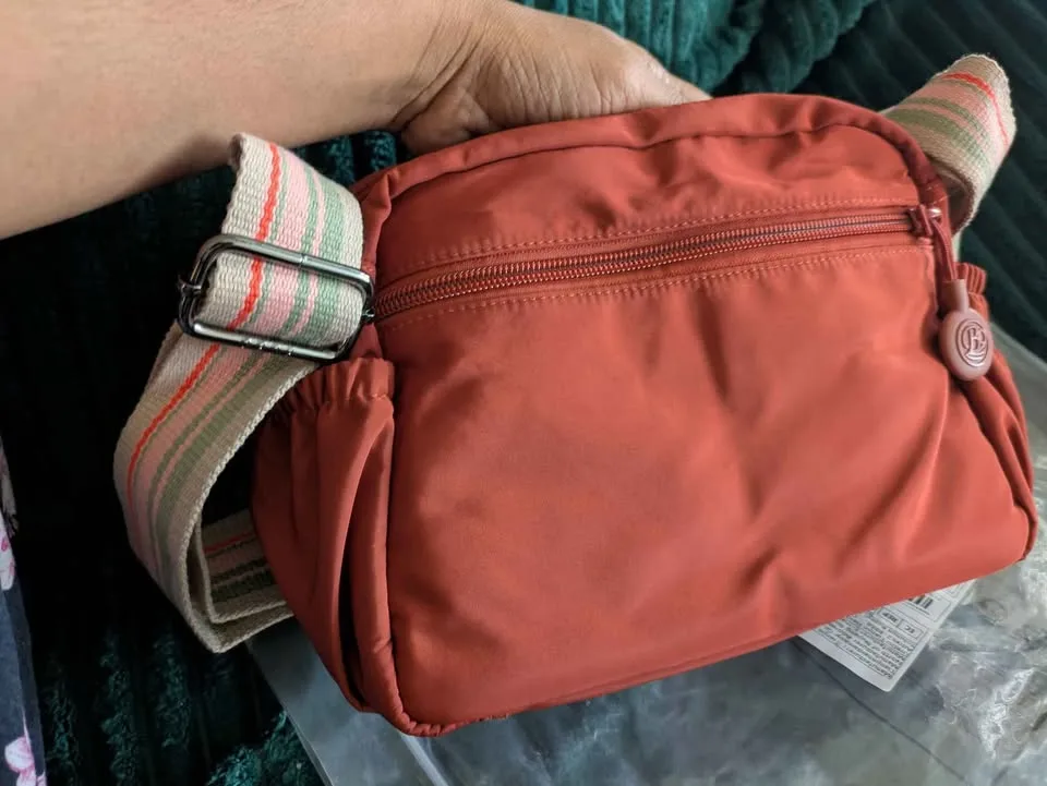 Brand new light weight nylon crossbody bag with multiple zips image indicator(8)