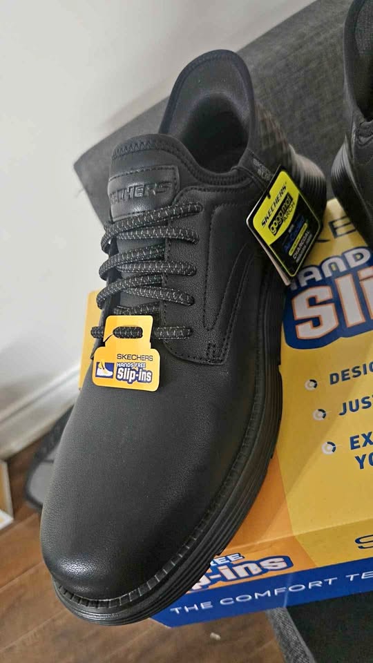 Skechers slip ons, complete with tags and the original box.