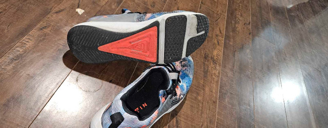 Under Armour next to new shoe - photo 3
