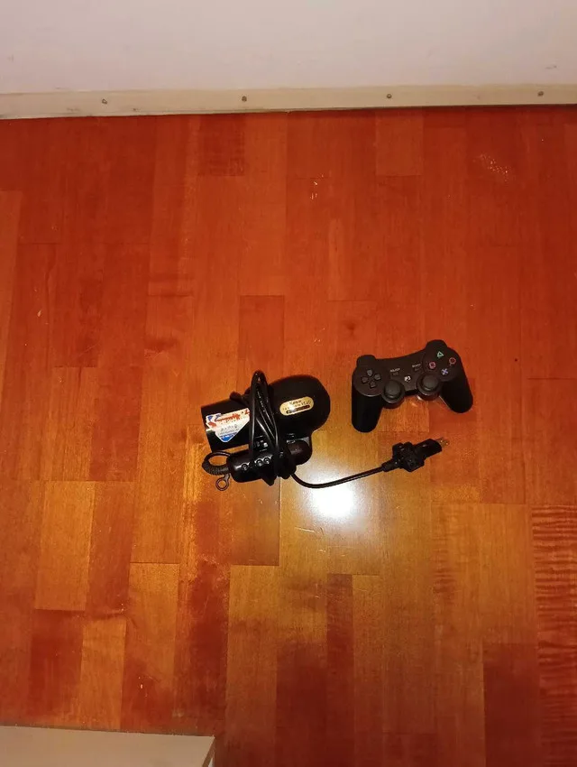 PlayStation 3 Controller and hair dryer thumbnail