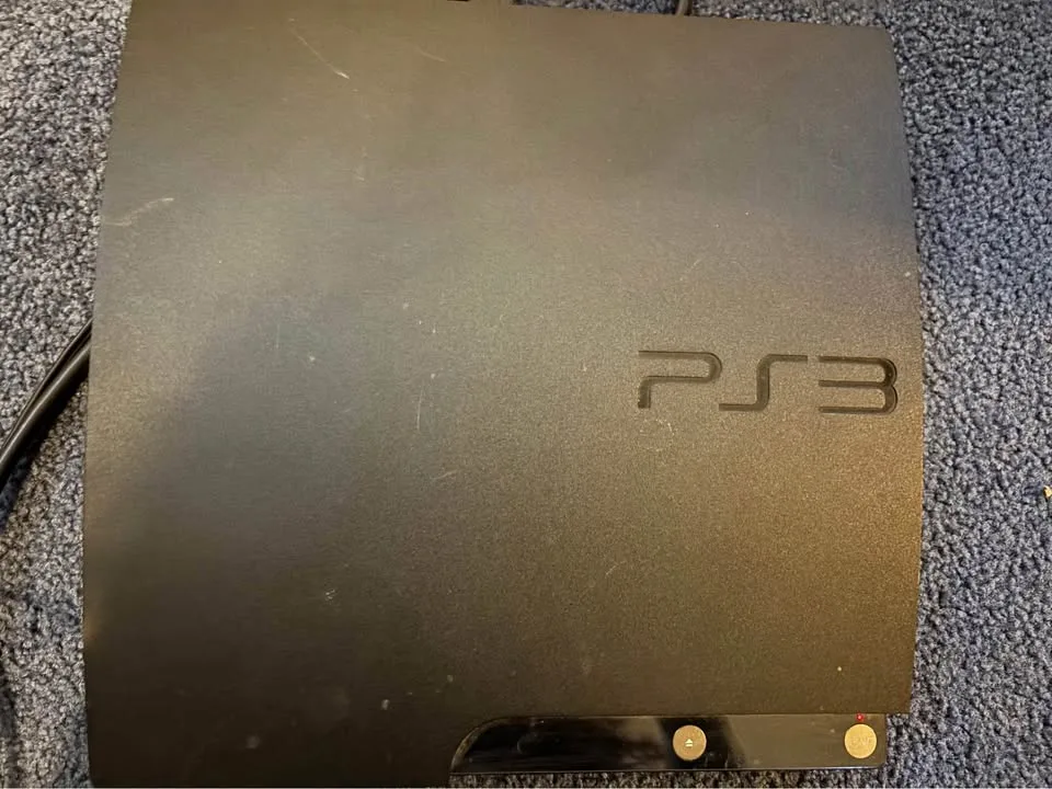 PS3 with accessories & games image indicator(3)