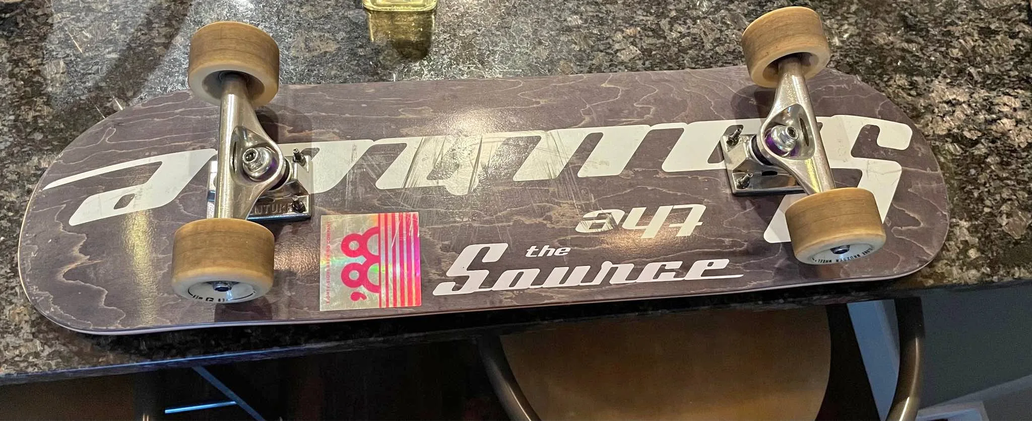 Source Skateboard with Venture trucks and Globe Bruiser Wheels