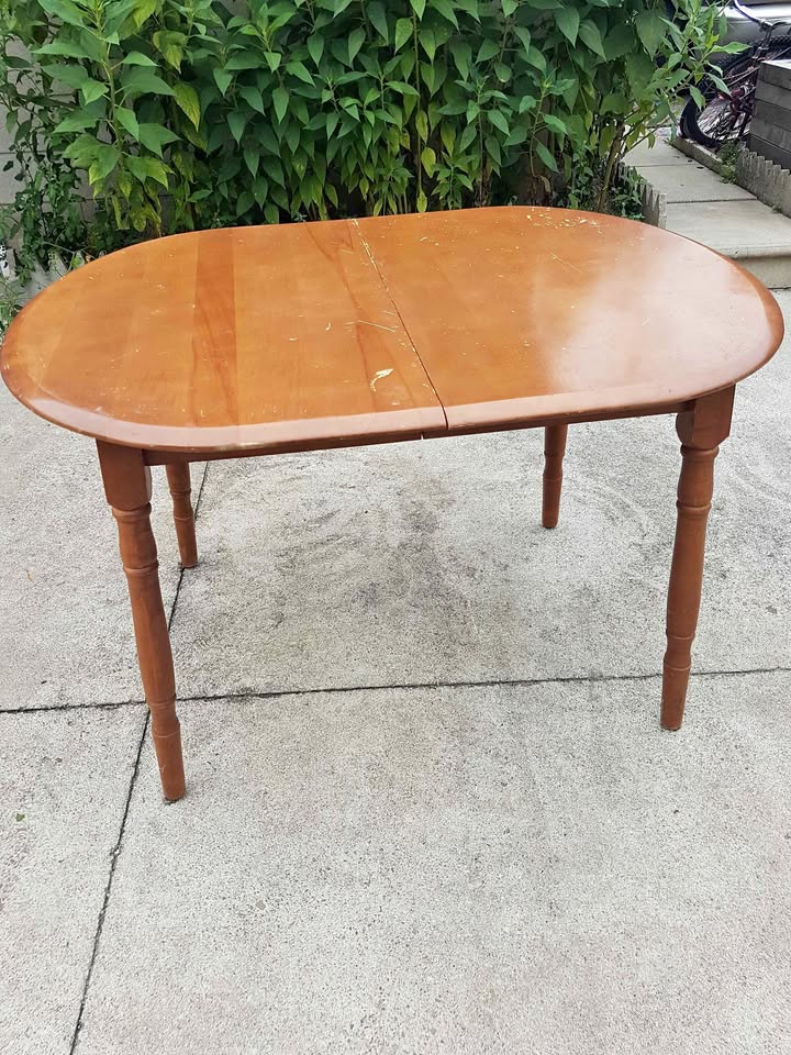 Old vintage oval solid wood kitchen table