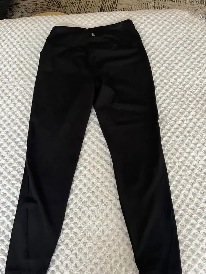 Lole black 3/4 length leggings. image indicator(3)