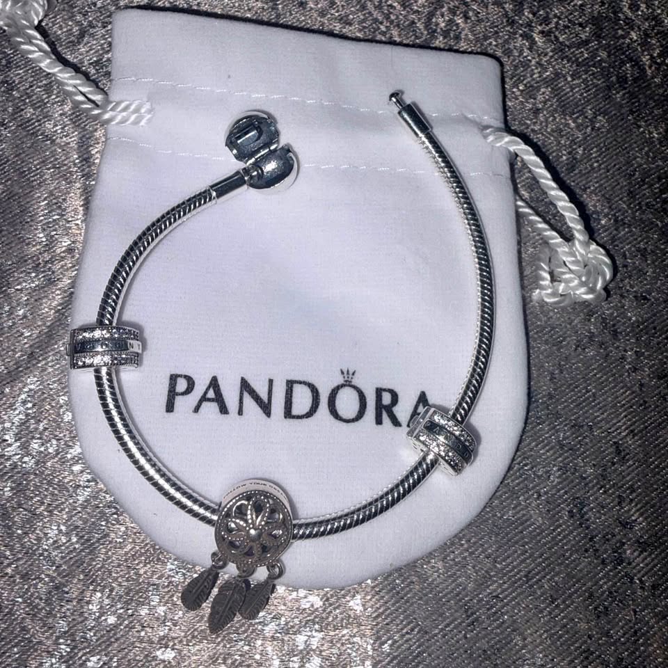 Pandora Silver bracelet with charms