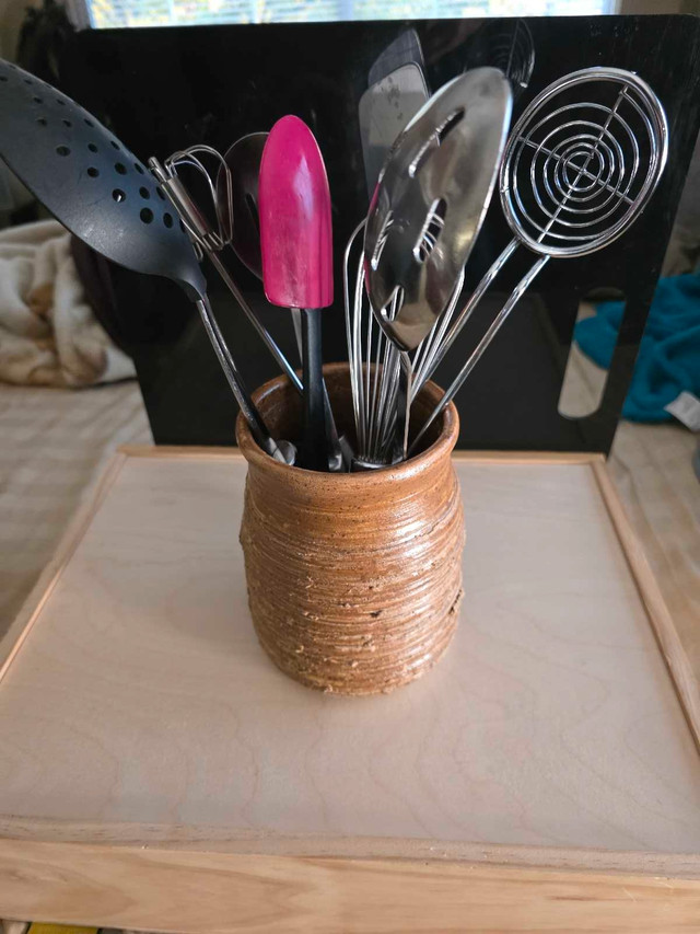 handcrafted pottery made special to hold utensils