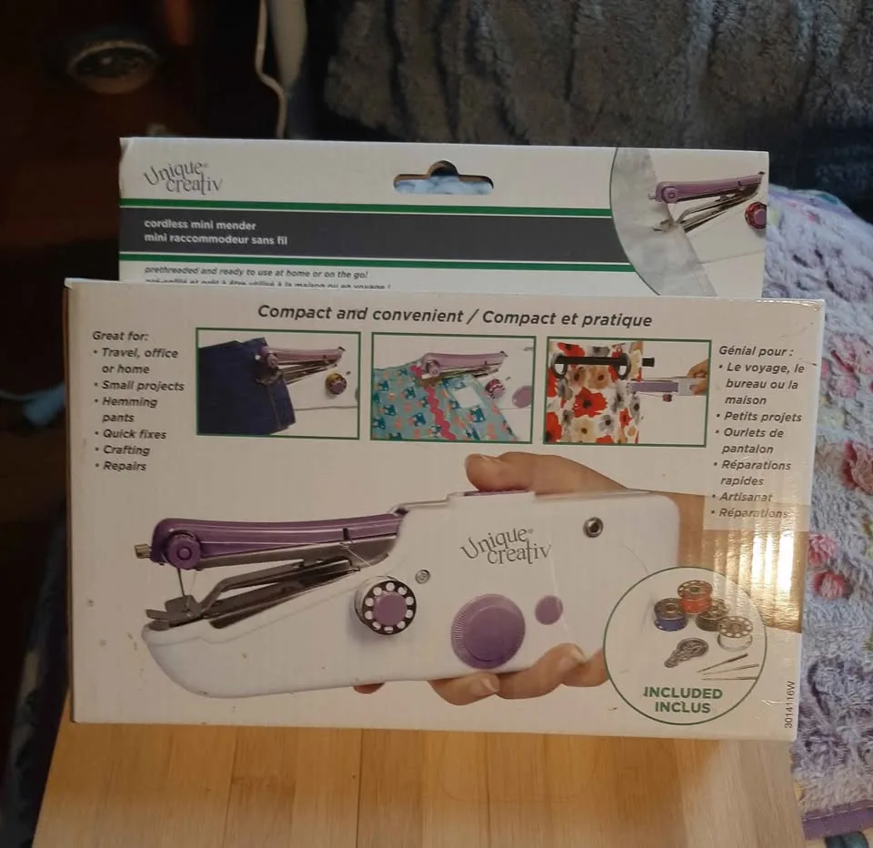 Hand held sewing machine. image indicator(2)