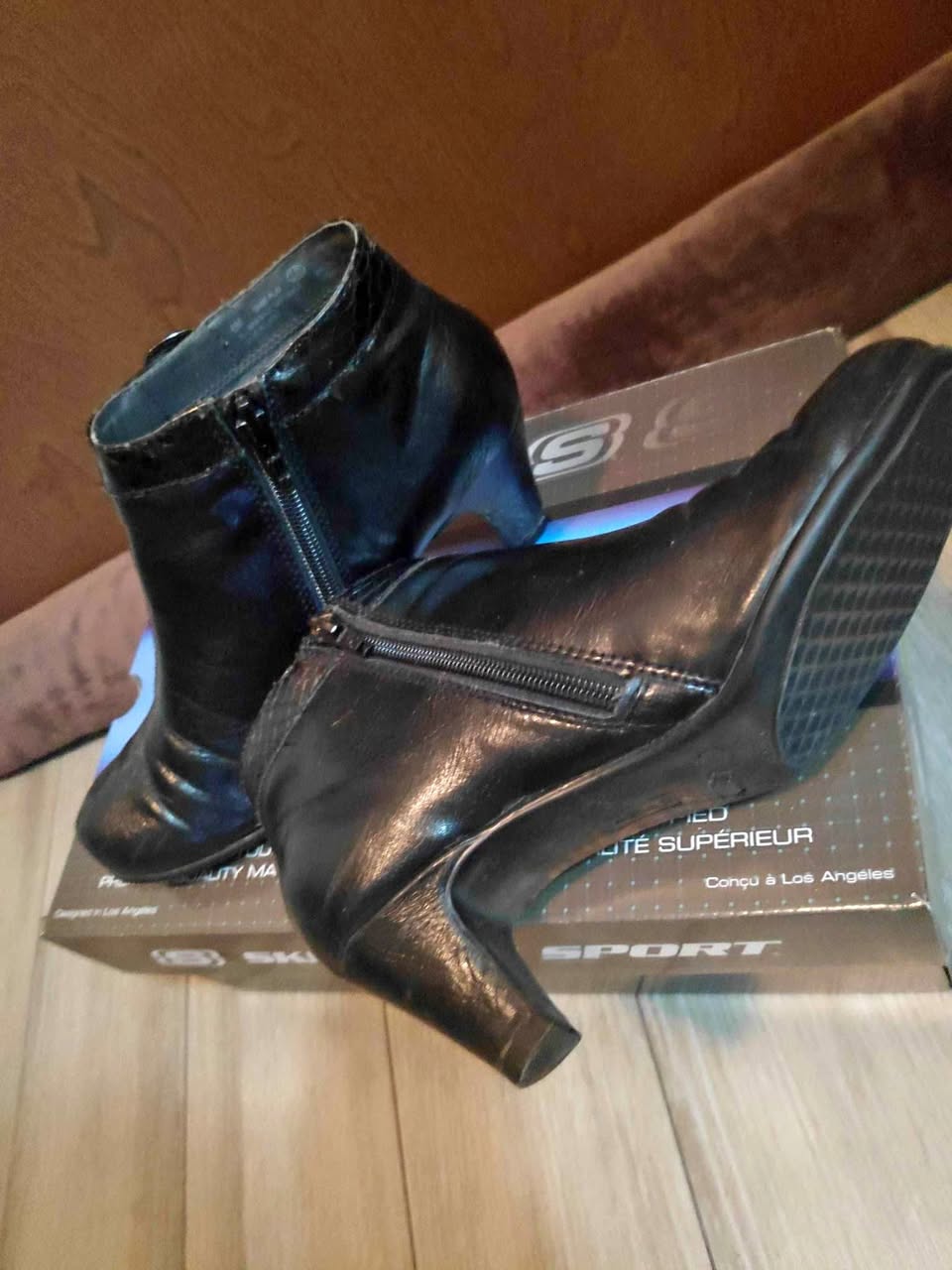 Ankle boot with belt buckle detail