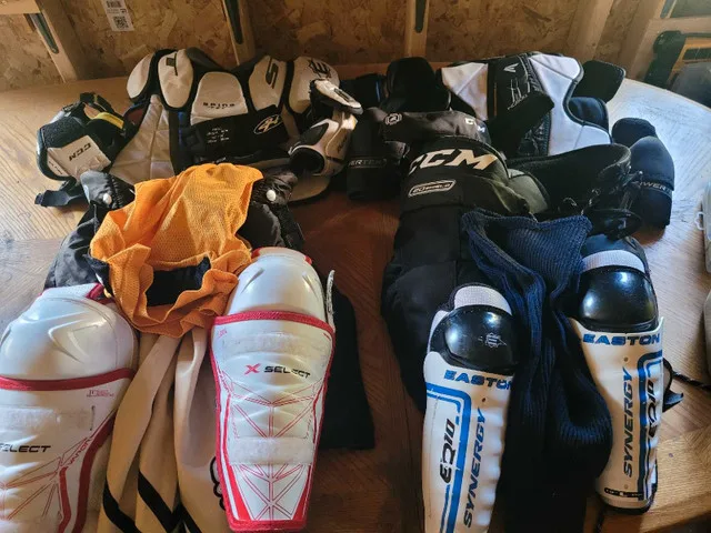2 pairs of junior hockey pants/pads