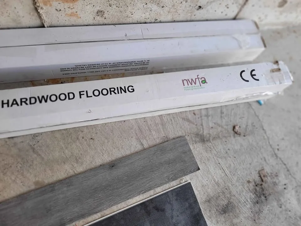 Brand new Grey Hardwood floor tiles. Two unopened boxes. image indicator(2)