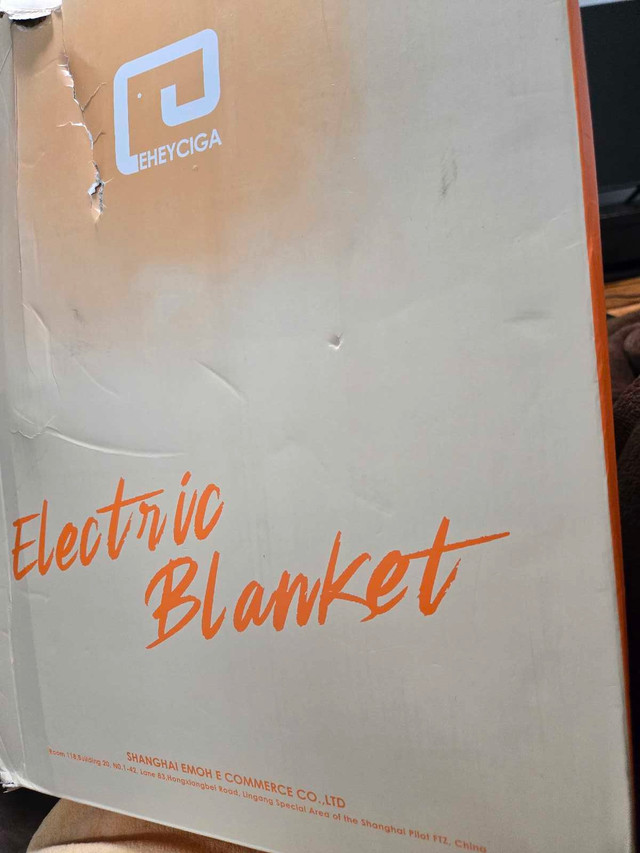 Electric blanket in original packaging: EHEYCIGA. KING size bla