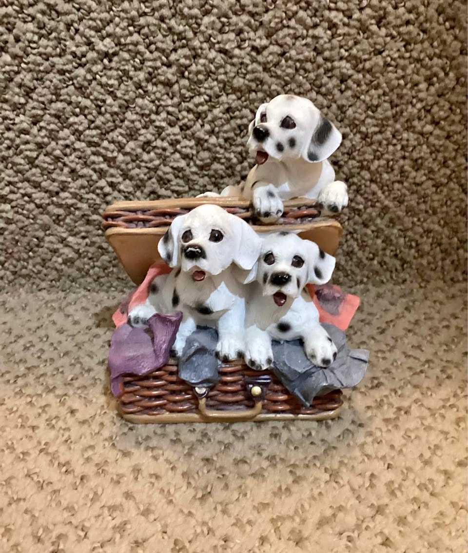 Dogs in basket figure