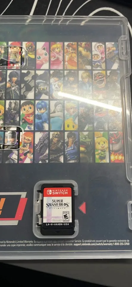 Selling Nintendo switch with 3 games and a controller image indicator(3)