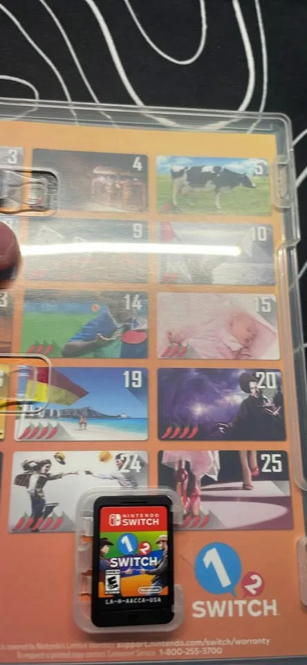 Selling Nintendo switch with 3 games and a controller image indicator(5)