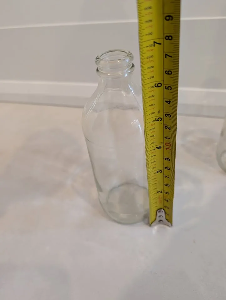 Two smaller clear glass vases image indicator(2)