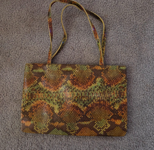 Authentic BCBG Women purse. Green. Python imitation. Real leathe