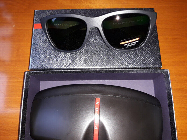 Authentic Prada Sunglasses SPS 03Q Polarized. BRAND NEW!