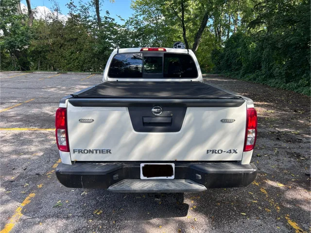 2016 Nissan Frontier 4WD King Cab Auto PRO-4X image indicator(9)