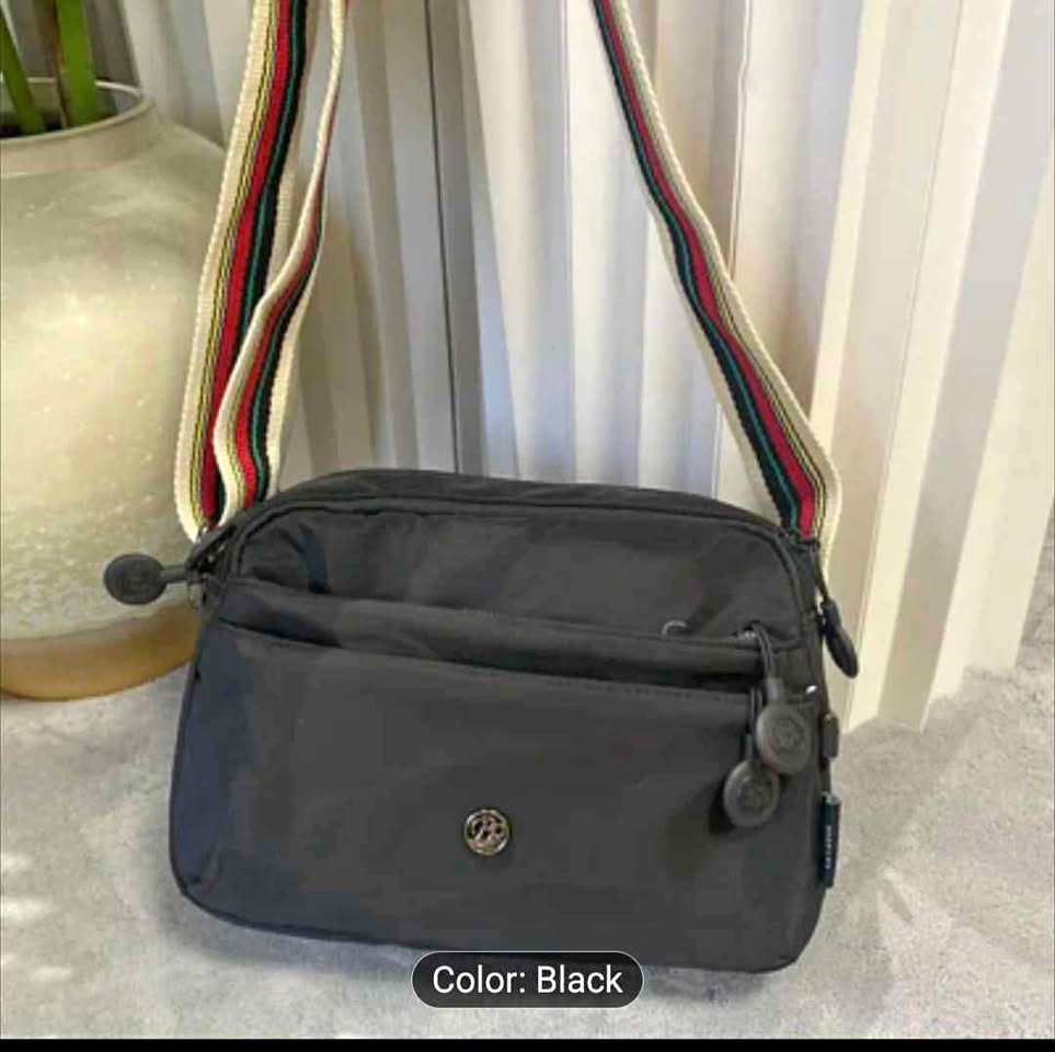 Brand new light weight nylon black cross body bag