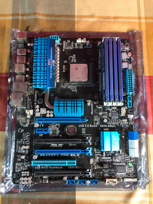 ASUS M5A99FX PRO R2.0 Motherboard + AMD FX-8350 CPU Combo thumbnail