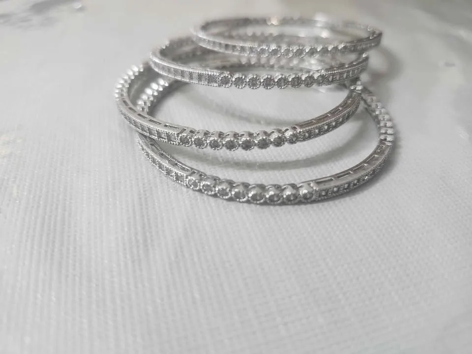 ✨ Elegant Silver Bangles – Set of 4 ✨ image indicator(4)