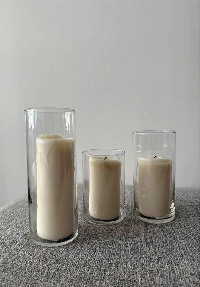 47 hurricane vases with candles