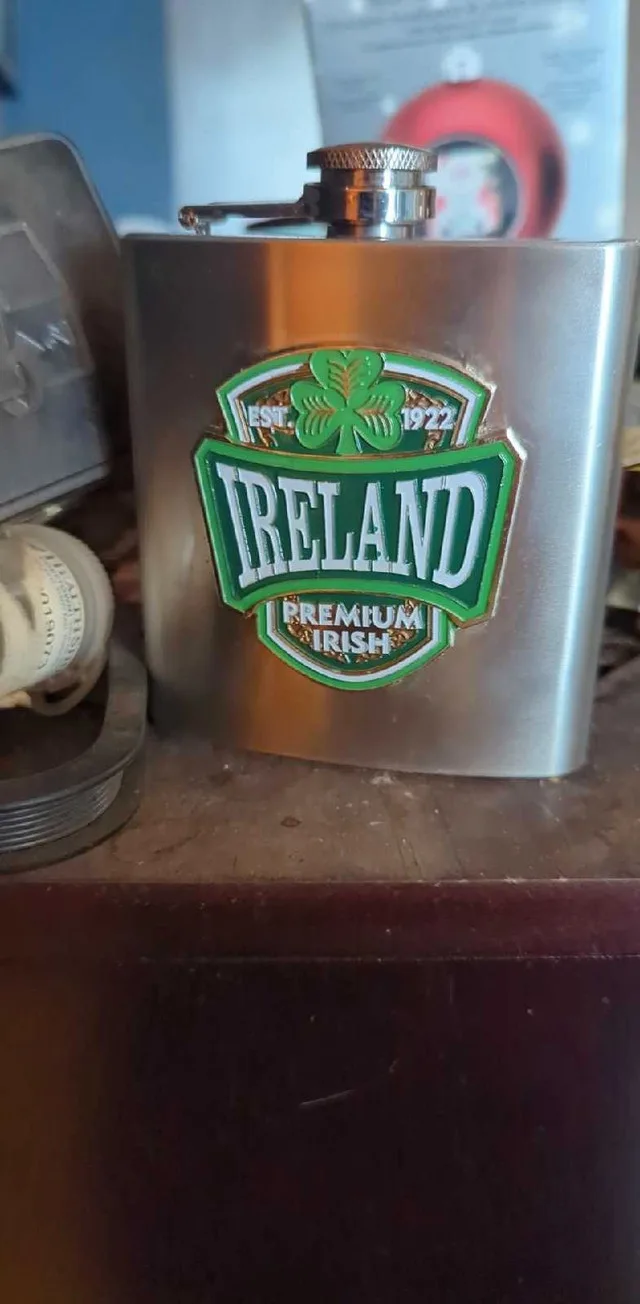 Brand new stainless steel Irish flask. image indicator(3)