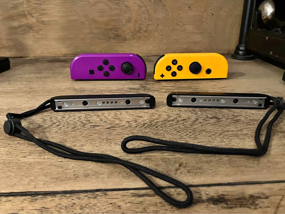 Nintendo Switch Neon Orange and Purple Joy Cons