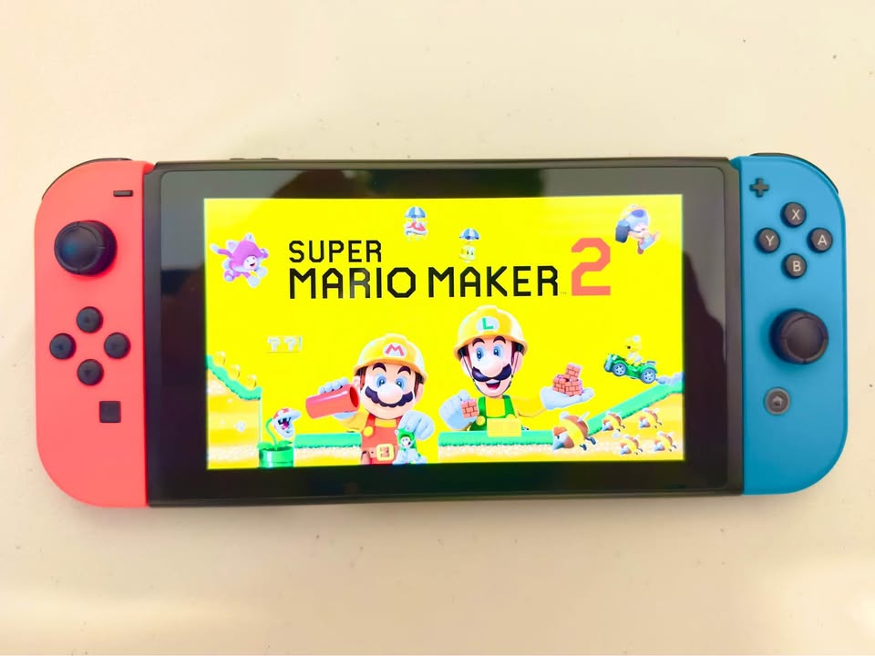 Nintendo Switch + RingFit + Mario Maker 2 + Case + MicroSD - photo 5