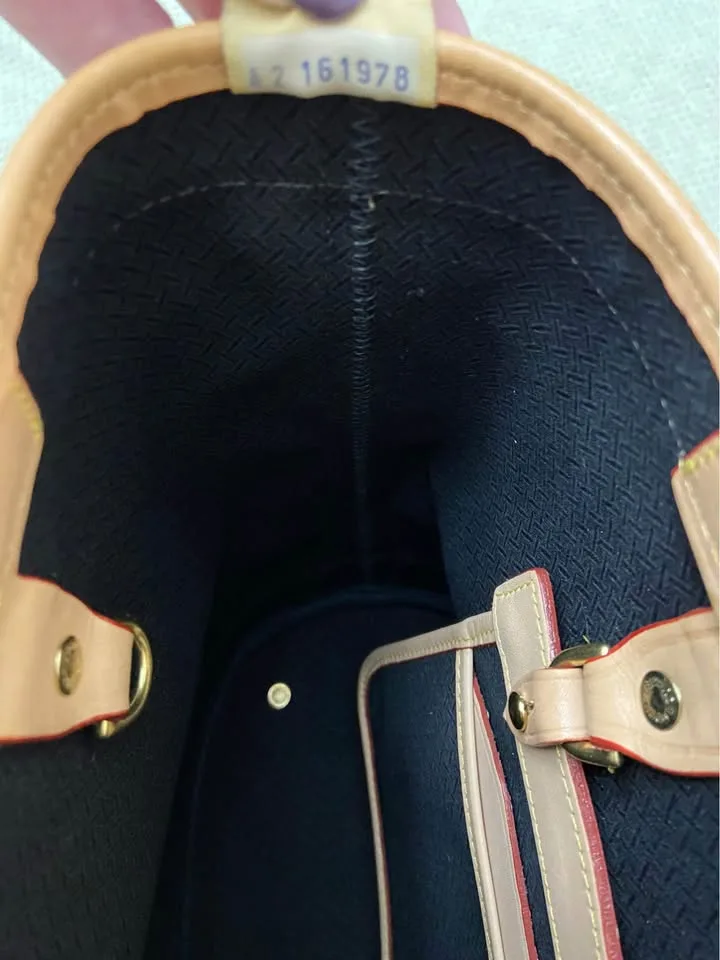Dooney & Bourke Cabriolet Bucket Bag, in Navy Blue/Tan image indicator(8)