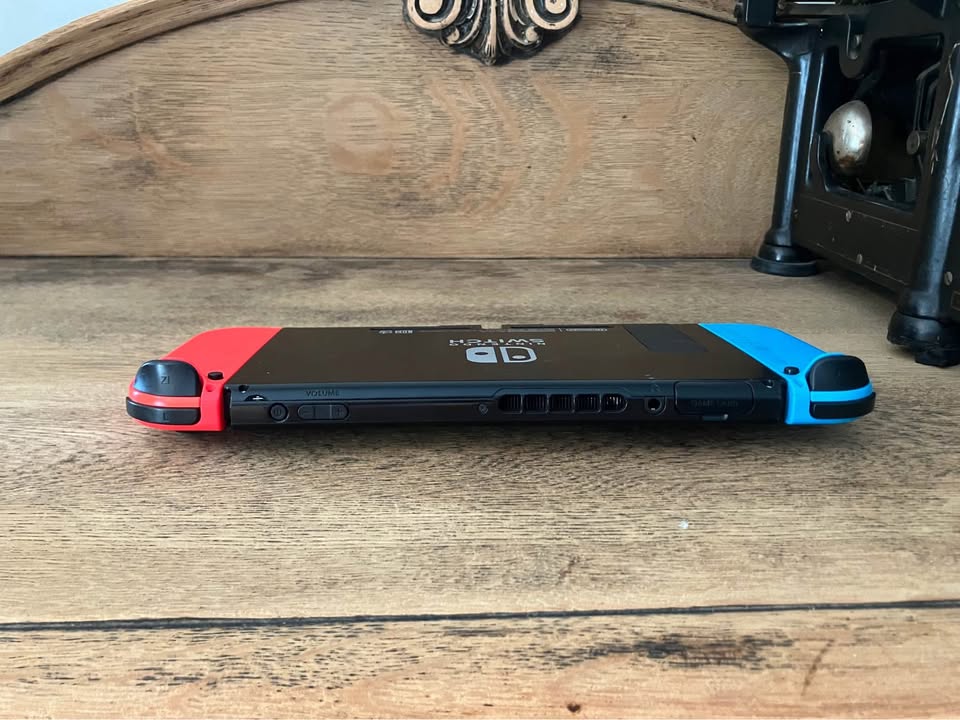 Nintendo Switch with Red and Blue Joy-Cons - photo 2