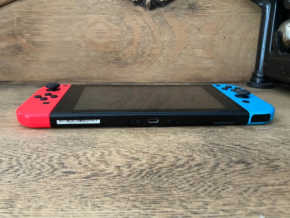 Nintendo Switch with Red and Blue Joy-Cons - photo 3