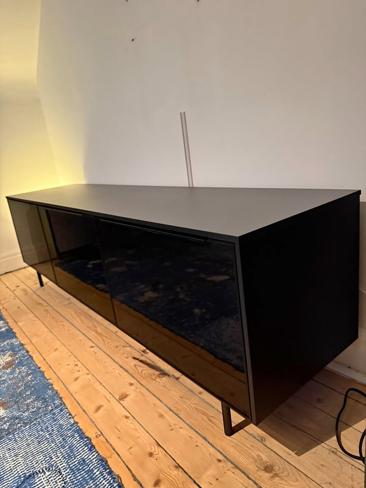 Black IKEA TV Bench with tinted glass doors