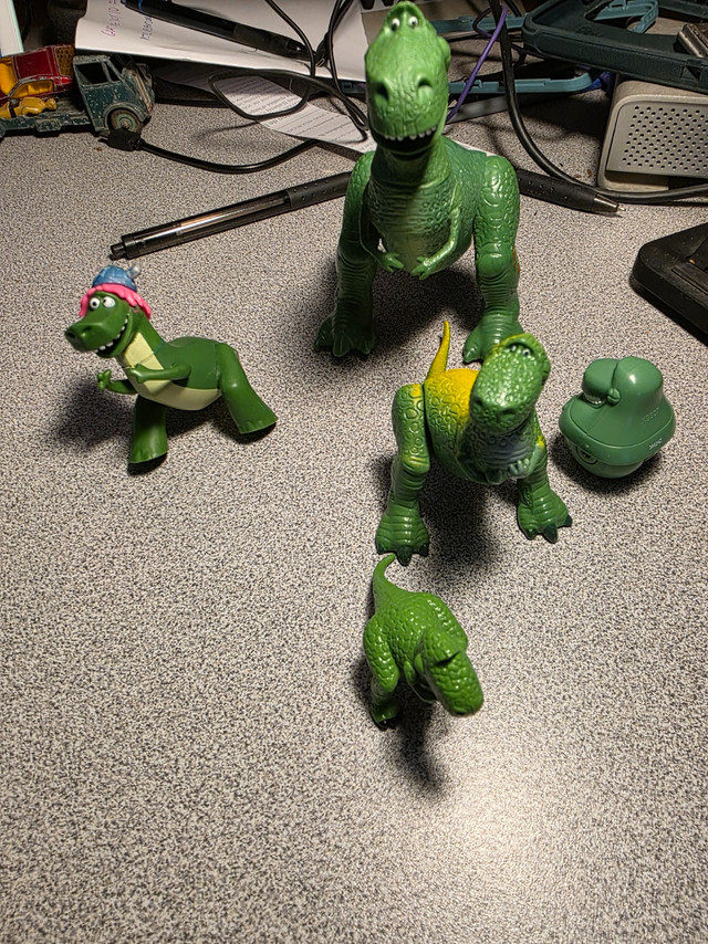 Lot of 8 Toy Story REX FiguresIn good condition