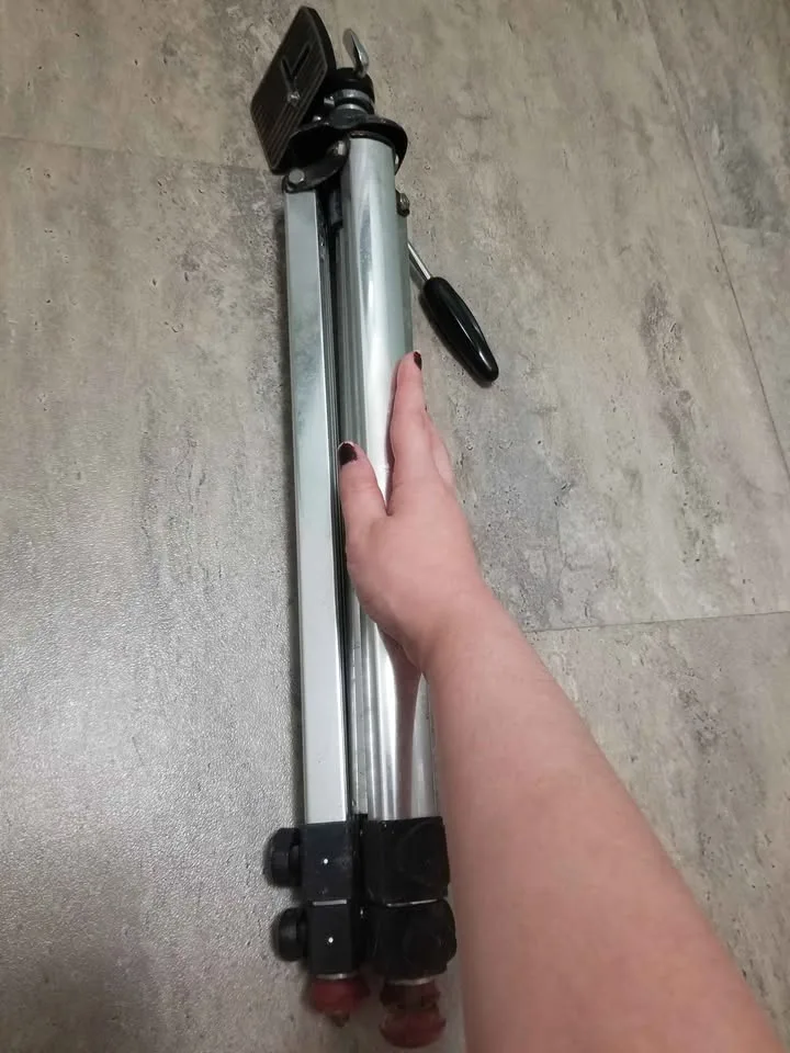 Camera Tripod may be vintage image indicator(8)