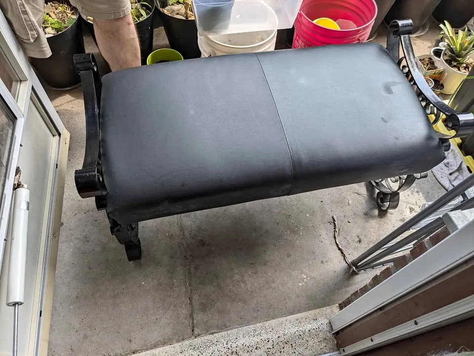 Iron bench with black material cushion thumbnail