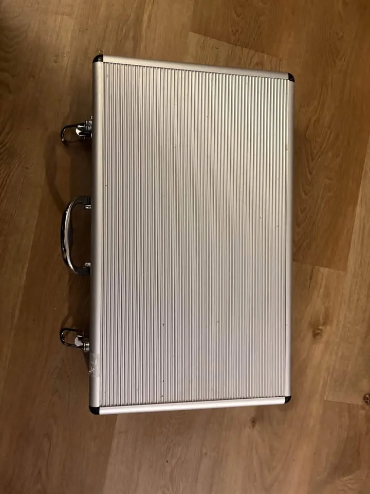 stainless steel BBQ tool set in a carrying case. image indicator(2)