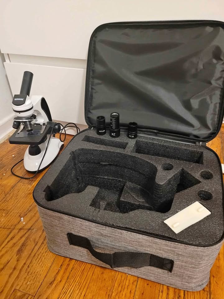 Microscope with carrying case and cellphone attachment