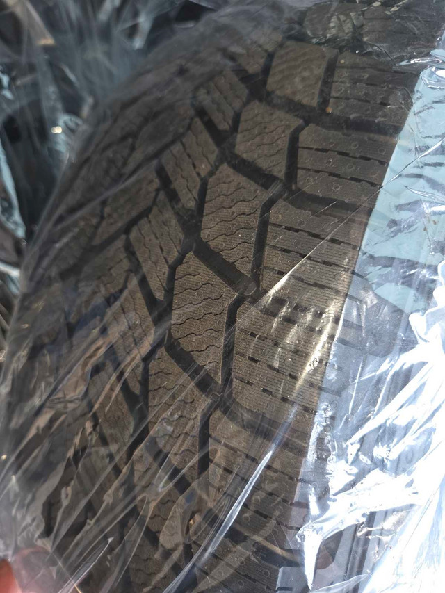 Michelin X-Ice 235/45R18 on Tesla Rims - photo 4