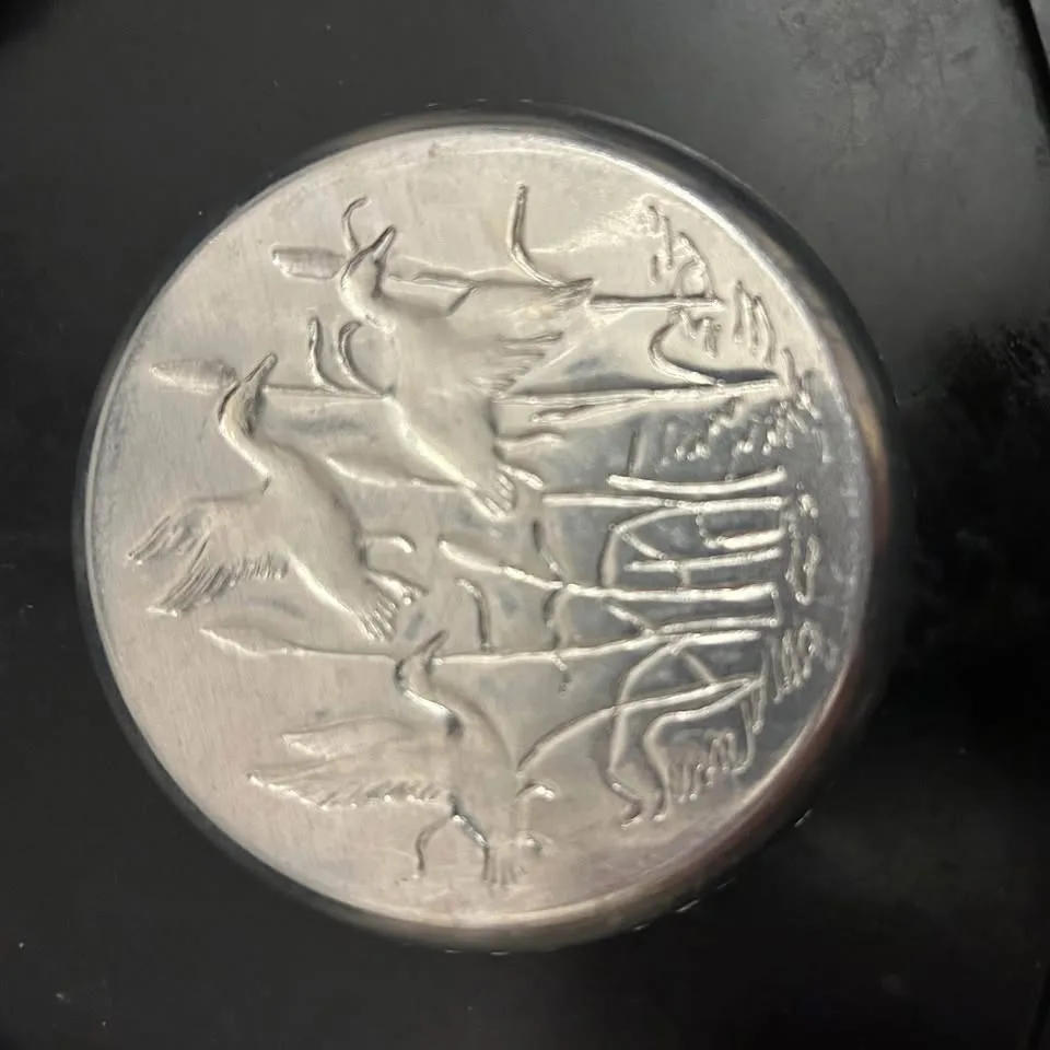 Set of 7 Vintage Embossed Metal Coasters image indicator(5)