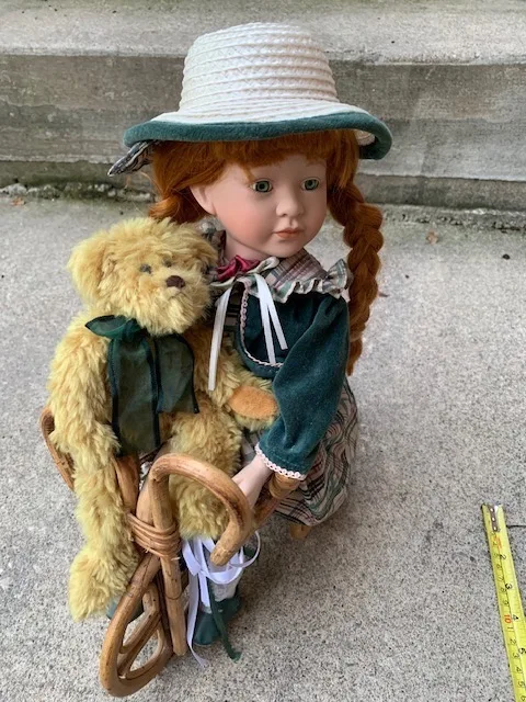 Doll - Porcelain Face - Riding Bicycle thumbnail